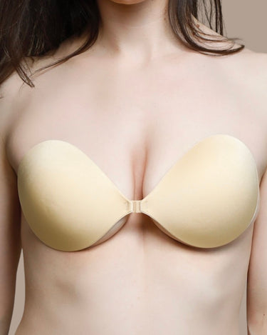 Woman wearing the BZEZ Fabric Sticky Bra in Bare, front view