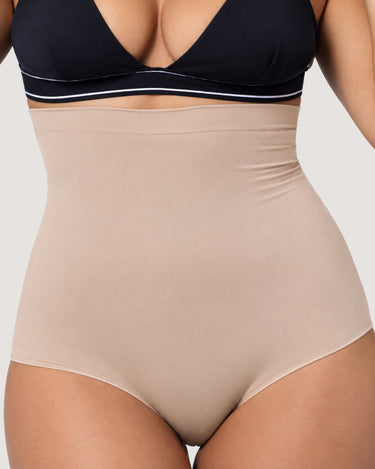 Woman wearing the BZEZ Smoothing Sculpt High-Waisted Brief in Bare, front view