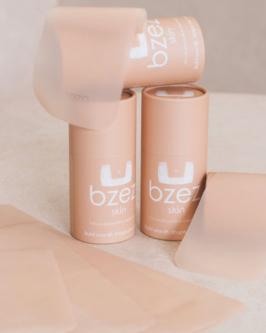 BZEZ SKIN silicone breast tape strips with their tube packaging
