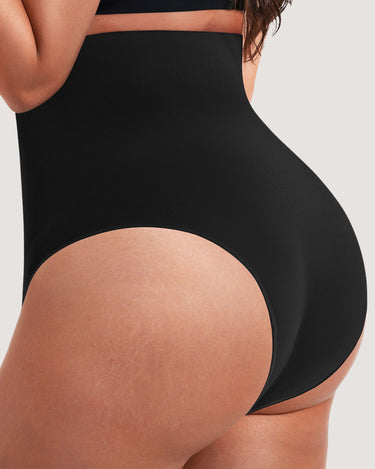 Woman wearing the BZEZ Mid Fit Control Brief in Onyx (black), back view