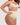 Woman wearing the BZEZ Mid Fit Control Thong in Bare, side view
