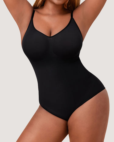 Woman wearing the BZEZ Smoothing Sculpt Bodysuit Brief in Onyx (black), front view