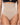 Woman wearing the BZEZ Smoothing Sculpt High-Waisted Thong in Bare, front view