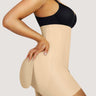 Woman wearing BZEZ Uplift Booty Shorts in Bare, side view