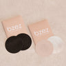 BZEZ satin Nipple Protectors in Bare and Onyx with their packets