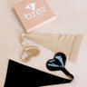 BZEZ Invisi G adhesive G-string in Bare and Onyx with box
